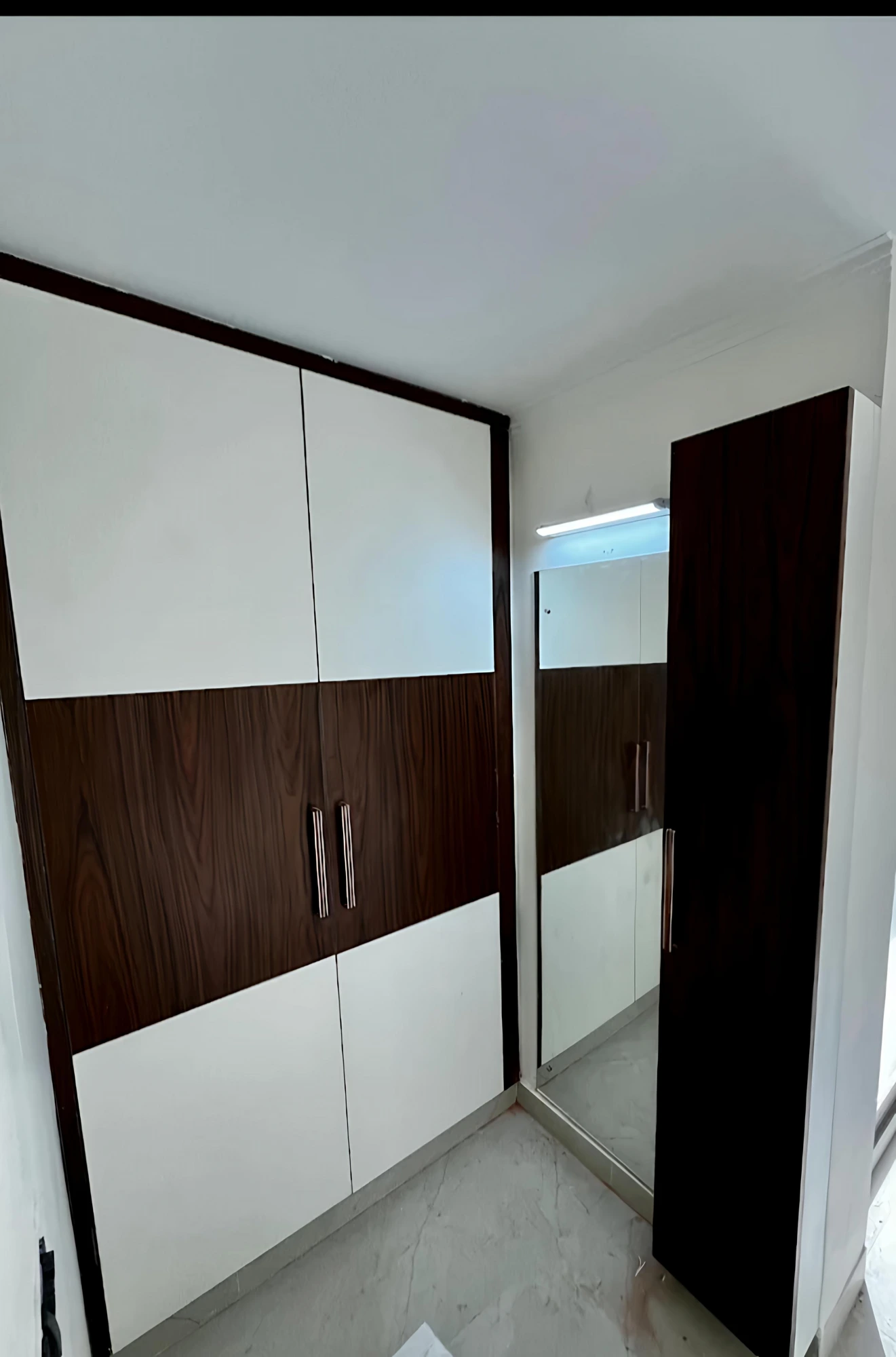 Walnut and white sliding wardrobe with mirrored dresser